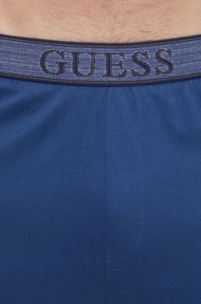 Бавовняна піжама Guess однотонна колір блакитний фото 7
