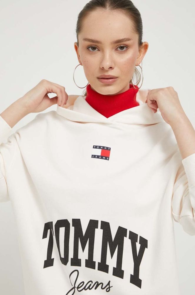 Бавовняна кофта Tommy Jeans жіноча колір бежевий з капюшоном з принтом (3427888)