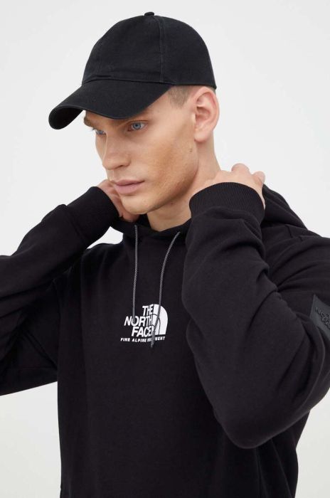 Бавовняна кофта The North Face чоловіча колір чорний з капюшоном з принтом (3519677)