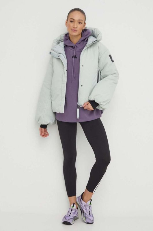 Пухова куртка adidas жіноча колір зелений зимова oversize фото 2