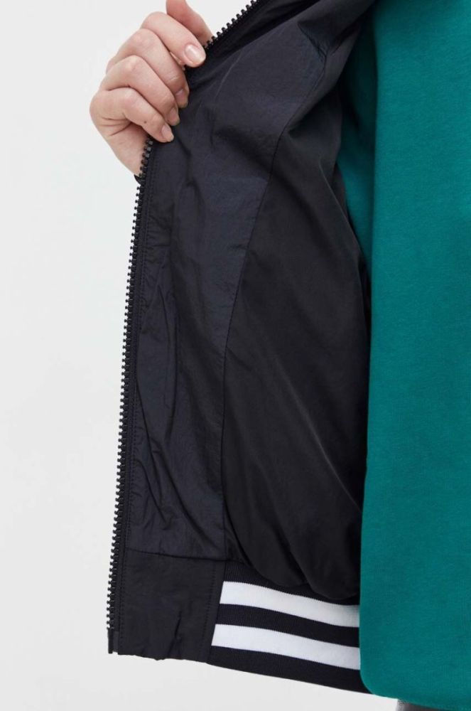 Куртка-бомбер Tommy Jeans жіночий колір чорний зимова oversize фото 6
