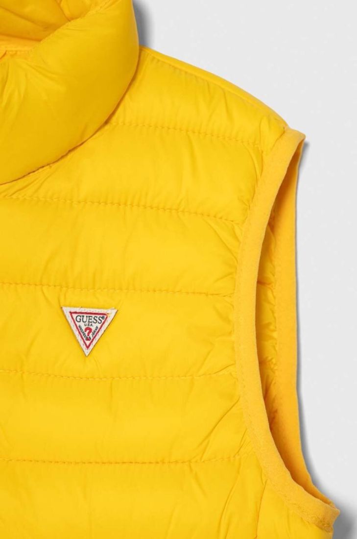 Дитяча безрукавка Guess колір жовтий
