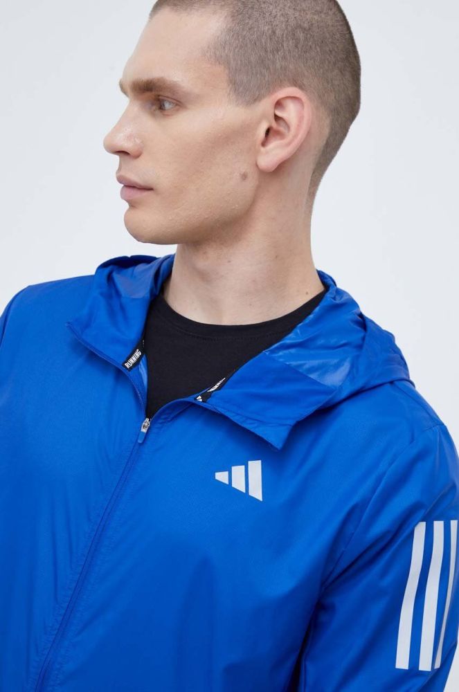 Вітровка adidas Performance Own the Run перехідна колір блакитний