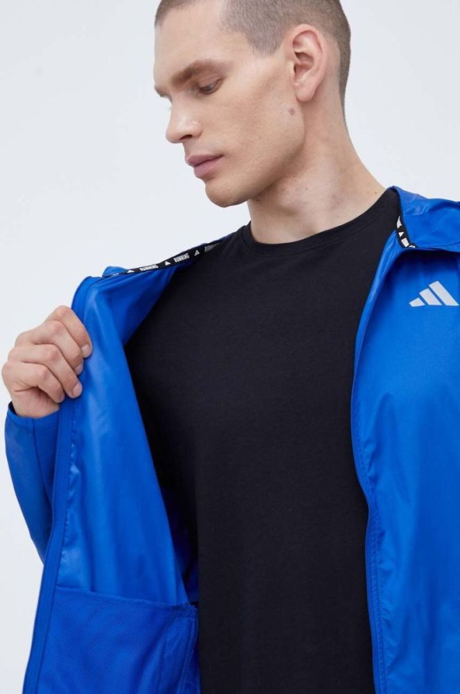 Вітровка adidas Performance Own the Run перехідна колір блакитний фото 6