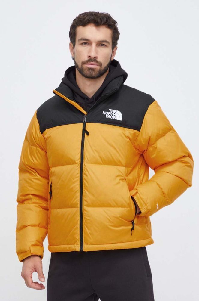 Пухова куртка The North Face чоловіча колір жовтий зимова (3638712)