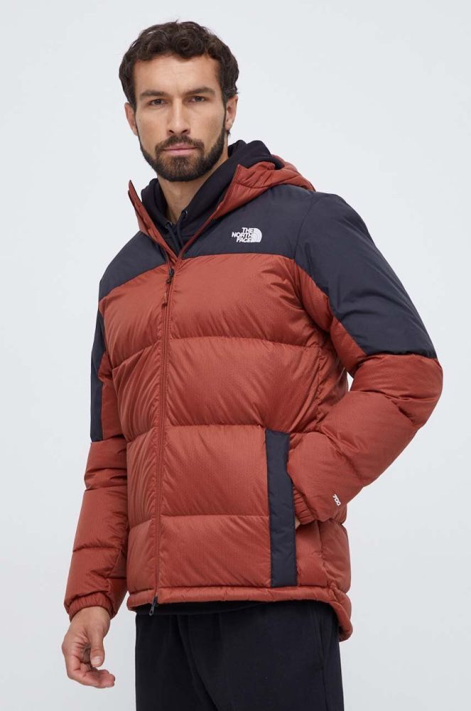 Пухова куртка The North Face чоловіча колір коричневий зимова (3593061)