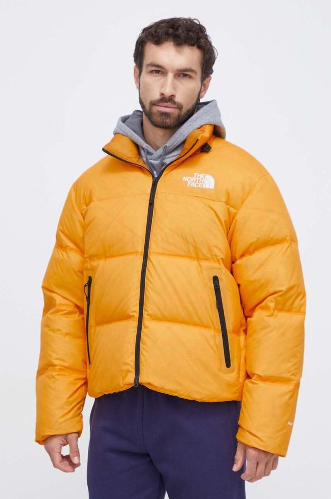Пухова куртка The North Face чоловіча колір жовтий зимова (3638716)