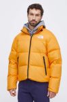 Пухова куртка The North Face чоловіча колір жовтий зимова (3638716)