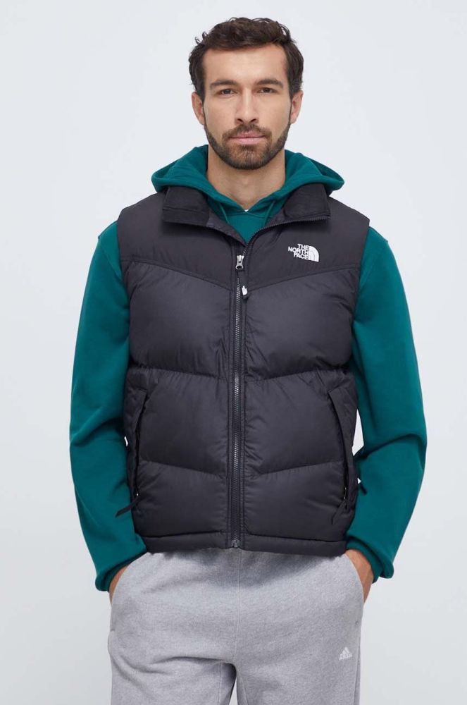 Безрукавка The North Face чоловічий колір чорний зимовий