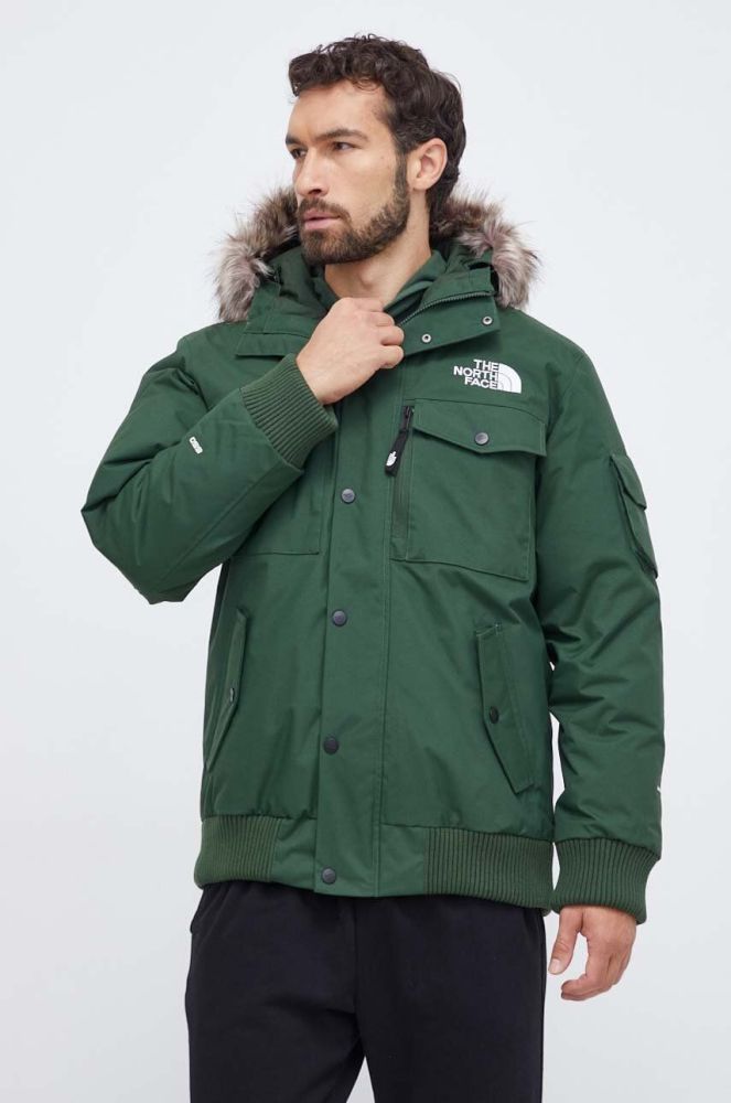 Пухова куртка The North Face чоловіча колір зелений зимова (3634969)