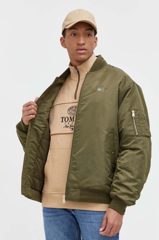 Куртка-бомбер Tommy Jeans колір зелений перехідна фото 6