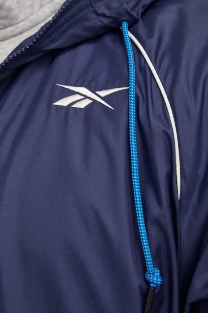 Куртка Reebok чоловіча колір синій перехідна oversize фото 4