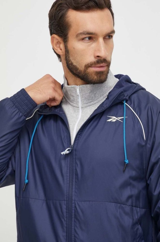 Куртка Reebok чоловіча колір синій перехідна oversize фото 5