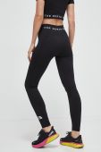 Спортивні легінси The North Face жіночі колір чорний однотонні