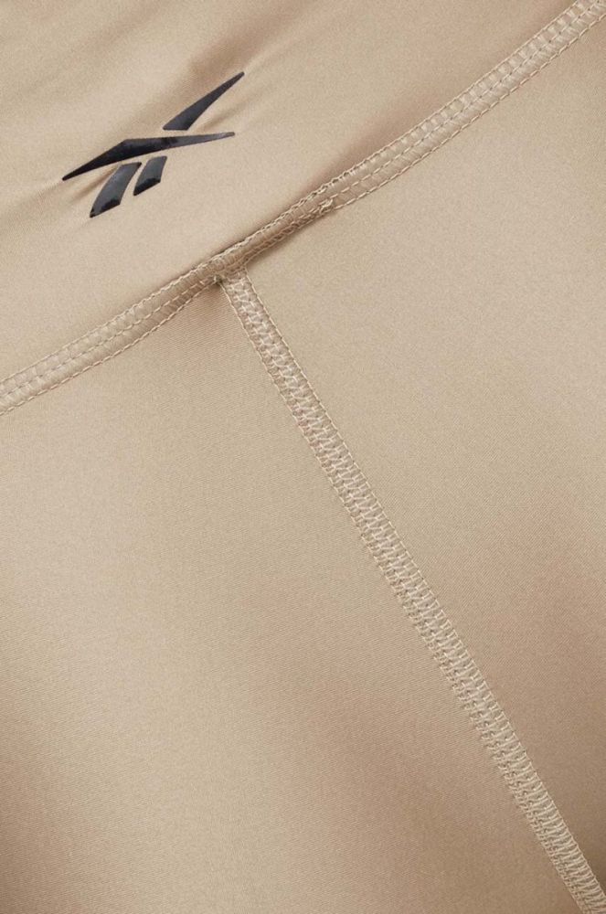 Легінси для тренувань Reebok Lux колір золотий однотонні фото 4