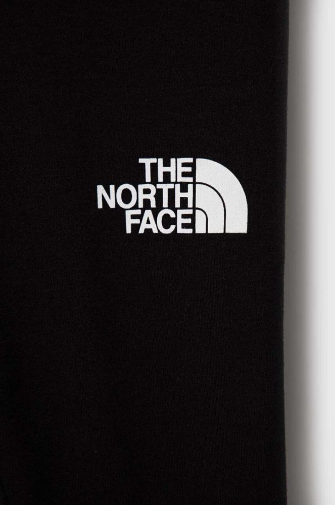 Дитячі легінси The North Face GRAPHIC LEGGINGS колір чорний з принтом фото 3
