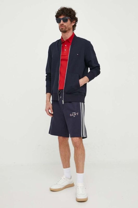 Поло Tommy Hilfiger чоловіче колір червоний однотонне фото 2
