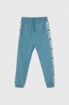 Дитячі спортивні штани Guess з принтом колір блакитний Дитячі спортивні штани Guess з принтом колір блакитний