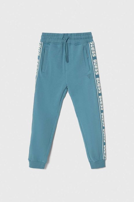 Дитячі спортивні штани Guess з принтом колір блакитний