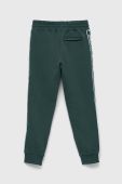 Дитячі спортивні штани Guess колір зелений з принтом