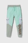 Дитячі спортивні штани Guess колір зелений візерунок (3369926) Дитячі спортивні штани Guess колір зелений візерунок (3369926)