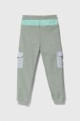 Дитячі спортивні штани Guess колір зелений візерунок (3369926)