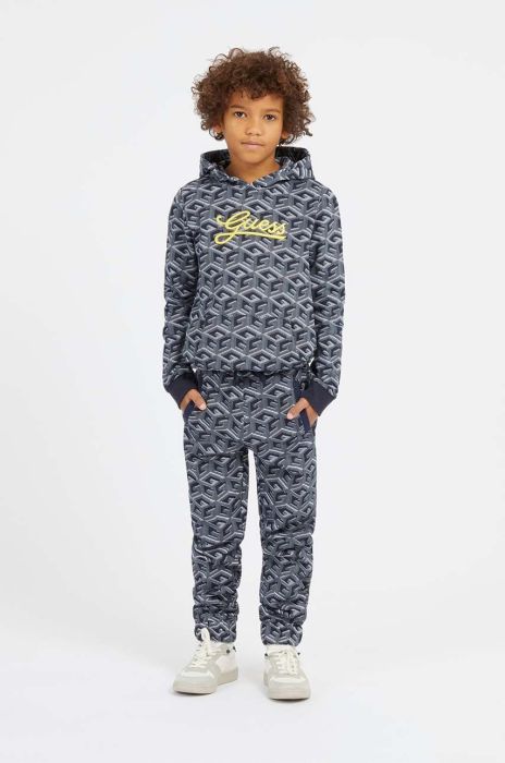 Дитячі бавовняні штани Guess колір синій візерунок (3404494)