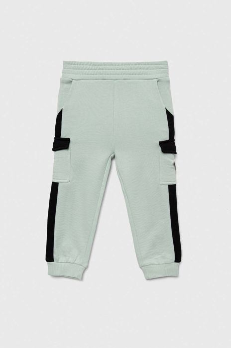 Дитячі бавовняні штани Guess колір бірюзовий візерунок