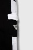 Дитячі бавовняні штани Guess колір чорний візерунок (3299425)