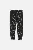 Дитячі бавовняні штани Coccodrillo колір чорний візерунок (3474503)
