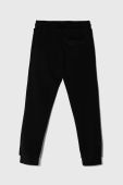 Дитячі бавовняні штани Guess колір чорний з аплікацією (3524034)