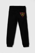 Дитячі бавовняні штани Guess колір чорний з аплікацією (3602670)