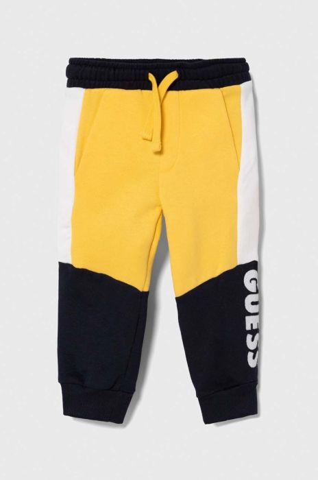 Дитячі бавовняні штани Guess колір синій візерунок (3582831)