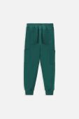 Дитячі бавовняні штани Coccodrillo ZC3120104ASJ колір зелений однотонні