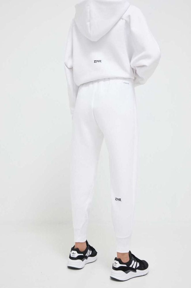 Спортивні штани adidas Z.N.E колір білий однотонні фото 3