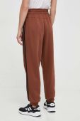 Бавовняні спортивні штани adidas колір коричневий з аплікацією