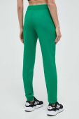 Бавовняні спортивні штани adidas Originals колір зелений однотонні