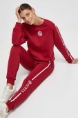 Спортивні штани Guess колір червоний з аплікацією