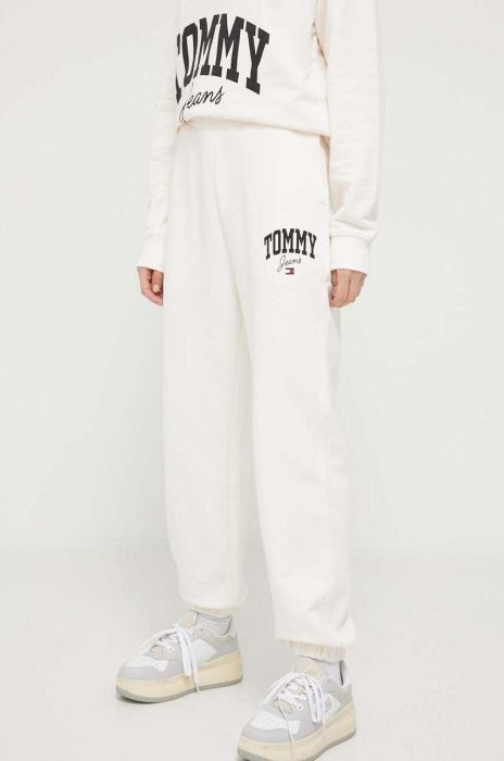 Бавовняні спортивні штани Tommy Jeans колір бежевий з принтом