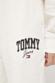 Бавовняні спортивні штани Tommy Jeans колір бежевий з принтом