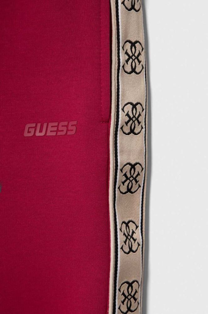 Дитячі спортивні штани Guess колір бордовий візерунок фото 3