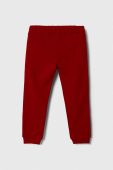 Дитячі бавовняні штани United Colors of Benetton колір червоний однотонні (3395060)