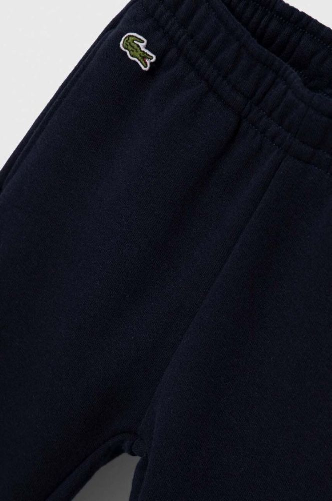Дитячі спортивні штани Lacoste колір синій меланж фото 3