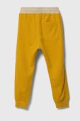 Дитячі спортивні штани United Colors of Benetton колір жовтий однотонні (3547559)