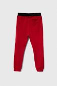 Дитячі спортивні штани United Colors of Benetton колір червоний однотонні