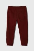 Дитячі спортивні штани United Colors of Benetton колір бордовий однотонні (3603049)