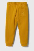 Дитячі спортивні штани United Colors of Benetton колір жовтий однотонні (3602927)