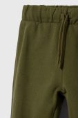 Дитячі спортивні штани United Colors of Benetton колір зелений однотонні (3602921)