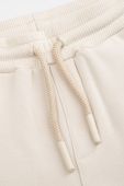 Дитячі спортивні штани Coccodrillo колір бежевий однотонні (3642301)