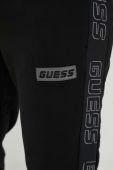 Спортивні штани Guess колір чорний з аплікацією (3395079)